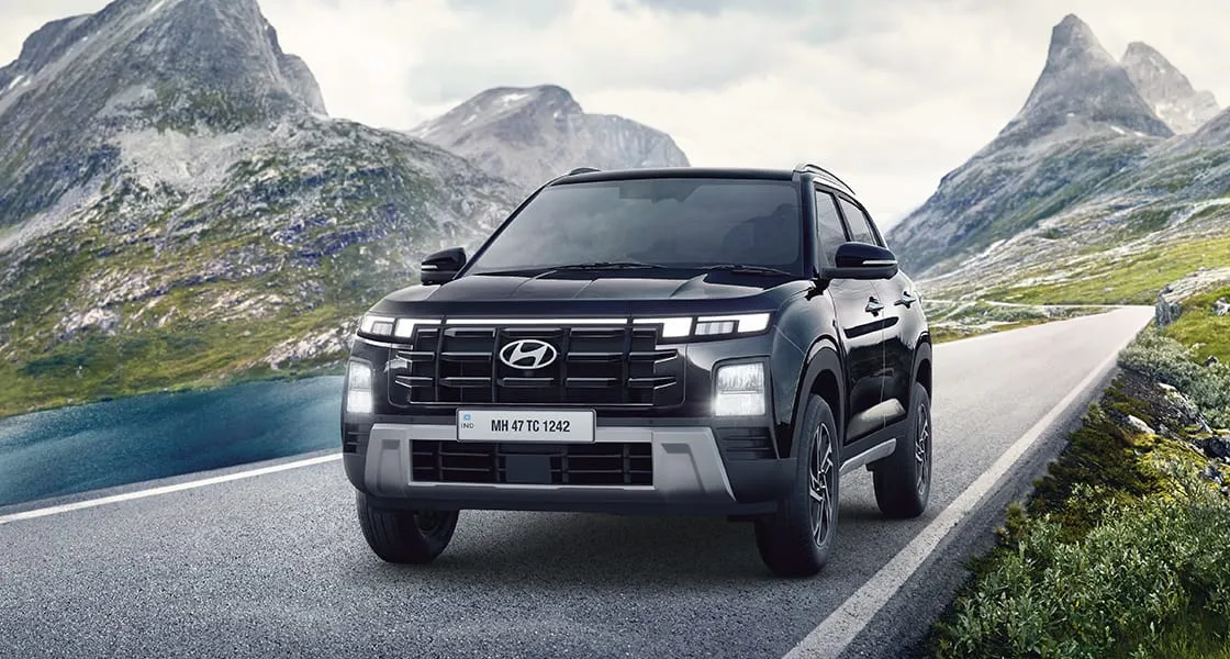 Hyundai Creta in black on a mountain road