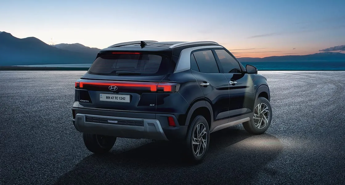 Hyundai Creta in black, rear three-quarter view at dusk
